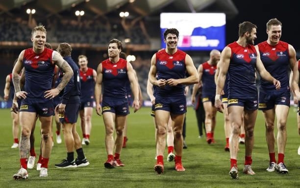 Christian Petracca of the Demons leaves the field after a win during the 2021 AFL Round 23 match between the Geelong Cats and the Melbourne Demons at...