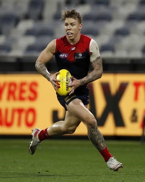James Harmes of the Demons in action during the 2021 AFL Round 23 match between the Geelong Cats and the Melbourne Demons at GMHBA Stadium on August...