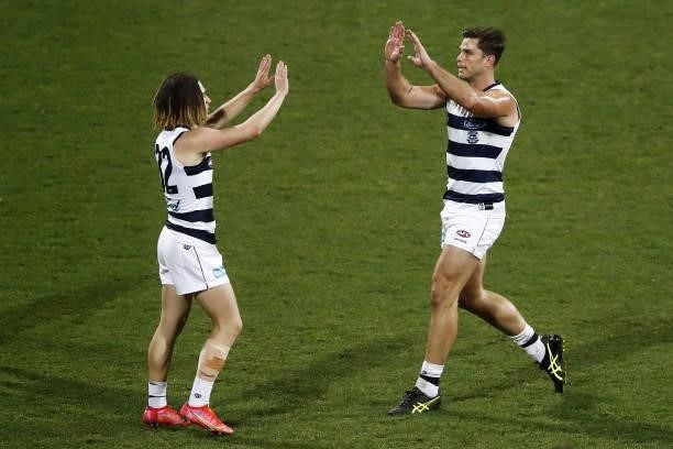 Tom Hawkins of the Cats celebrates a goal with Gryan Miers of the Cats during the 2021 AFL Round 23 match between the Geelong Cats and the Melbourne...