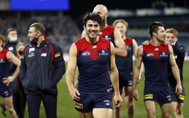 Christian Petracca of the Demons celebrates during the 2021 AFL Round 23 match between the Geelong Cats and the Melbourne Demons at GMHBA Stadium on...