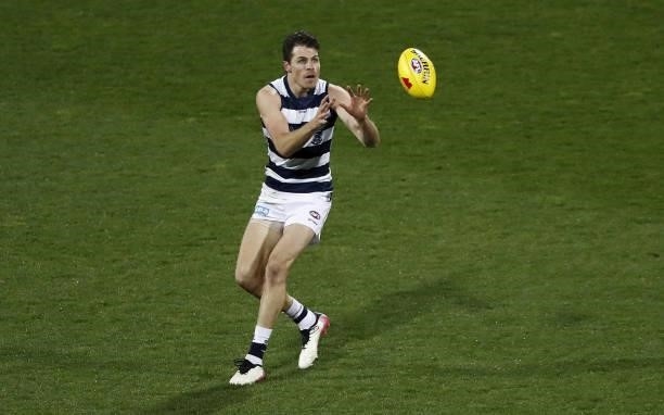 Isaac Smith of the Cats marks the ball during the 2021 AFL Round 23 match between the Geelong Cats and the Melbourne Demons at GMHBA Stadium on...