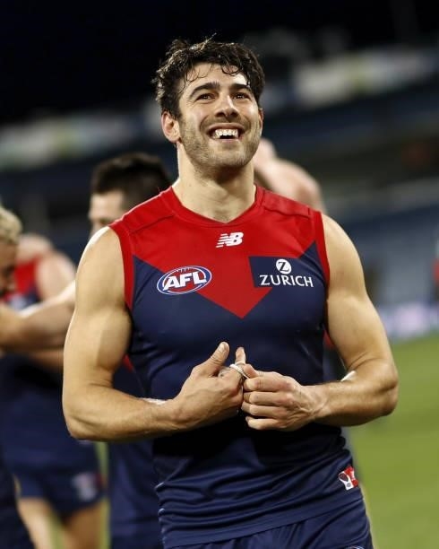 Christian Petracca of the Demons celebrates during the 2021 AFL Round 23 match between the Geelong Cats and the Melbourne Demons at GMHBA Stadium on...