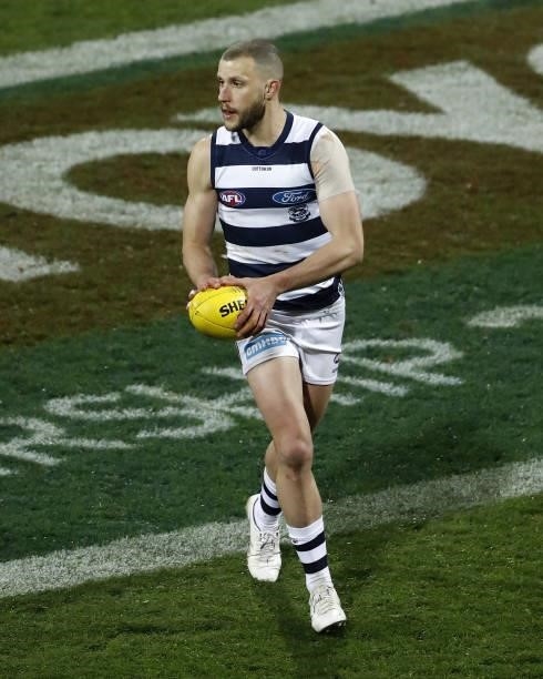 Sam Menegola of the Cats looks on during the 2021 AFL Round 23 match between the Geelong Cats and the Melbourne Demons at GMHBA Stadium on August 21,...