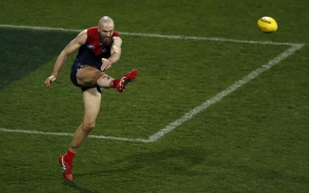 Max Gawn of the Demons kicks the ball during the 2021 AFL Round 23 match between the Geelong Cats and the Melbourne Demons at GMHBA Stadium on August...