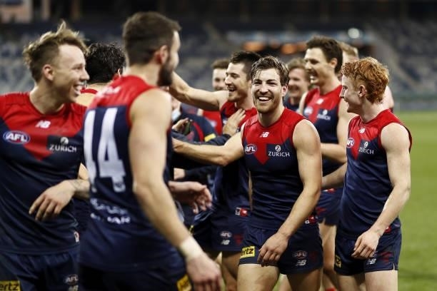 Jack Viney of the Demons celebrates during the 2021 AFL Round 23 match between the Geelong Cats and the Melbourne Demons at GMHBA Stadium on August...