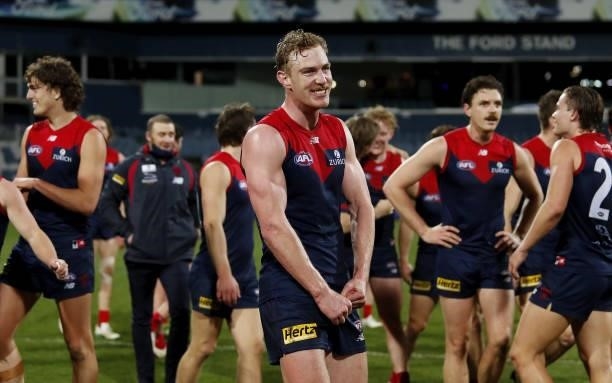 Harrison Petty of the Demons celebrates during the 2021 AFL Round 23 match between the Geelong Cats and the Melbourne Demons at GMHBA Stadium on...