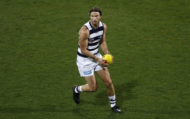 Lachie Henderson of the Cats looks on during the 2021 AFL Round 23 match between the Geelong Cats and the Melbourne Demons at GMHBA Stadium on August...