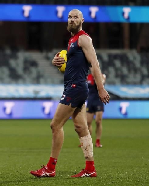 Max Gawn of the Demons looks up at the clock before running in to kick a Goal to win the game after the final siren during the 2021 AFL Round 23...