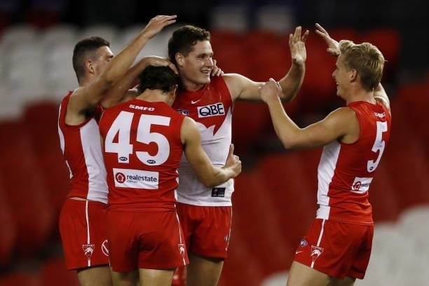 Hayden McLean of the Swans celebrates a goal with teammates during the 2021 AFL Round 23 match between the Sydney Swans and the Gold Coast Suns at...
