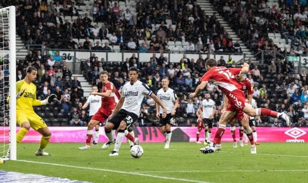 Middlesbrough's Jonathan Howson heads at goal during the Sky Bet Championship match between Derby County and Middlesbrough at Pride Park Stadium on...