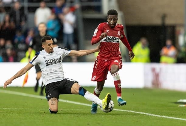 Middlesbrough's Isaiah Jones competing with Derby County's Ravel Morrison during the Sky Bet Championship match between Derby County and...