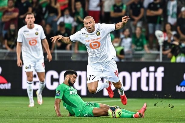 Mahdi CAMARA of Saint Etienne and Burak YILMAZ of Lille during the French Ligue 1 Uber Eats soccer match between Saint Etienne and Lille at Stade...