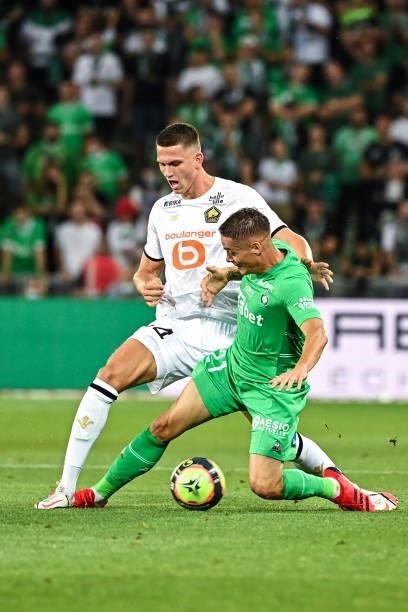Sven BOTMAN of Lille and Romain HAMOUMA of Saint Etienne during the French Ligue 1 Uber Eats soccer match between Saint Etienne and Lille at Stade...