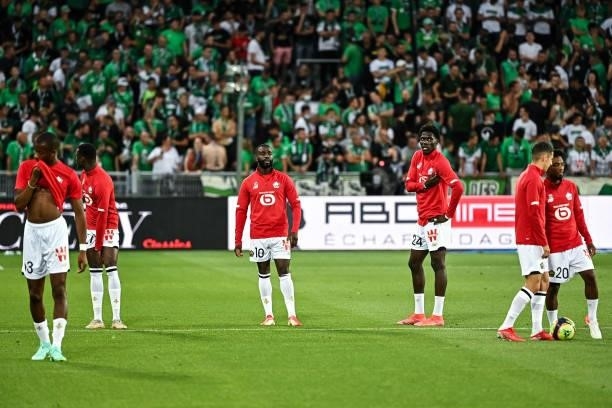 Tiago DJALO of Lille, Jonathan IKONE of Lille, Amadou ONANA of Lille warm up prior to the French Ligue 1 Uber Eats soccer match between Saint Etienne...