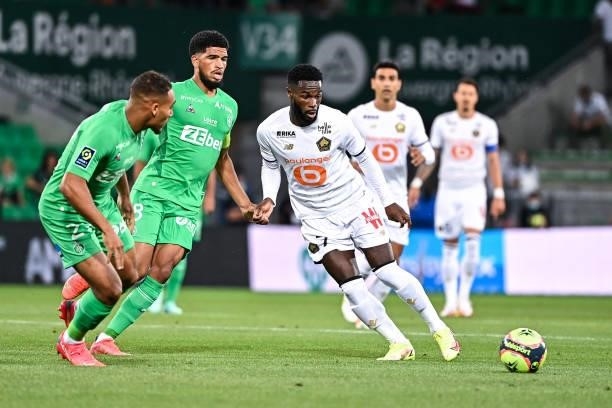 Mahdi CAMARA of Saint Etienne and Jonathan BAMBA of Lille during the French Ligue 1 Uber Eats soccer match between Saint Etienne and Lille at Stade...