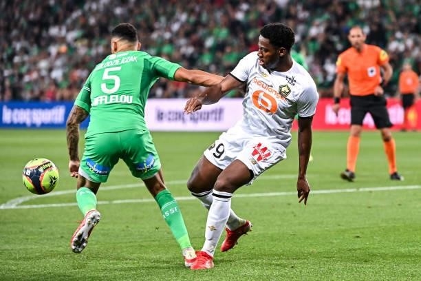 Timothee KOLODZIEJCZAK of Saint Etienne and Jonathan DAVID of Lille during the French Ligue 1 Uber Eats soccer match between Saint Etienne and Lille...