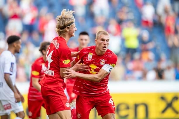 Maurits Kjaergaard and Rasmus Kristensen of FC Red Bull Salzburg celebrate after Kristensen scored his team's third goal during the Admiral...