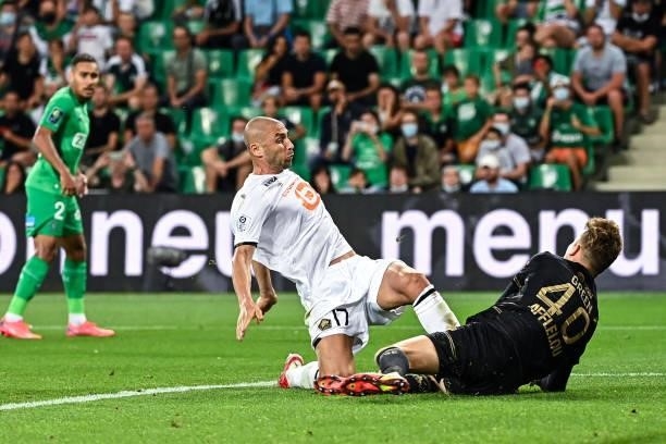 Burak YILMAZ of Lille and Etienne GREEN of Saint Etienne during the French Ligue 1 Uber Eats soccer match between Saint Etienne and Lille at Stade...