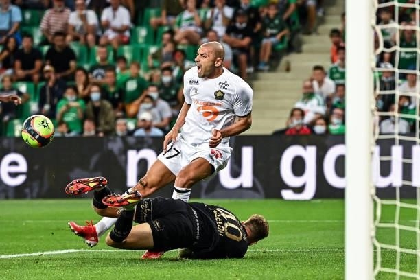 Burak YILMAZ of Lille and Etienne GREEN of Saint Etienne during the French Ligue 1 Uber Eats soccer match between Saint Etienne and Lille at Stade...