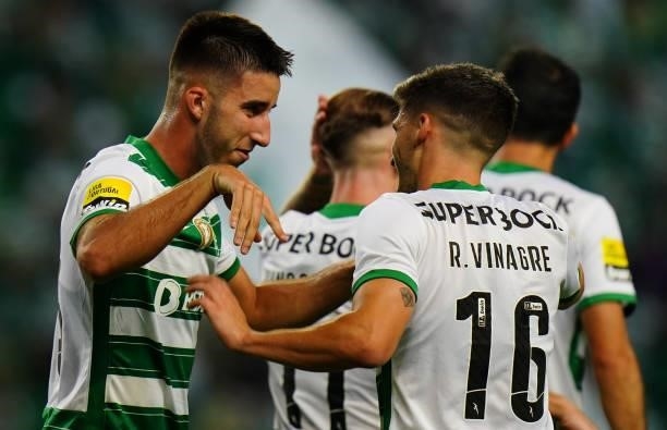 Goncalo Inacio of Sporting CP celebrates with teammate Ruben Vinagre of Sporting CP after scoring a goal during the Liga Bwin match between Sporting...
