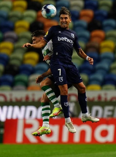 Pedro Nuno of Belenenses SAD with Ruben Vinagre of Sporting CP in action during the Liga Bwin match between Sporting CP and Belenenses SAD at Estadio...