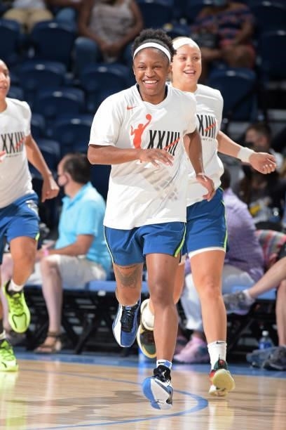 Crystal Dangerfield of the Minnesota Lynx smiles before the game against the Chicago Sky on August 21, 2021 at the Wintrust Arena in Chicago,...