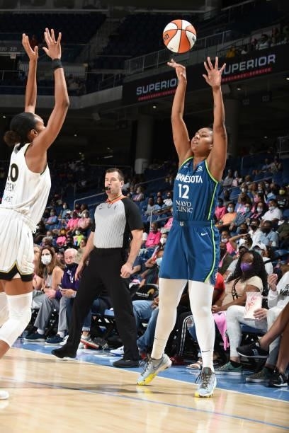 Damiris Dantas of the Minnesota Lynx passes the ball during the game against the Chicago Sky on August 21, 2021 at the Wintrust Arena in Chicago,...