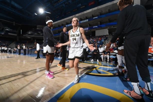 Allie Quigley of the Chicago Sky high fives teammates before the game against the Minnesota Lynx on August 21, 2021 at the Wintrust Arena in Chicago,...