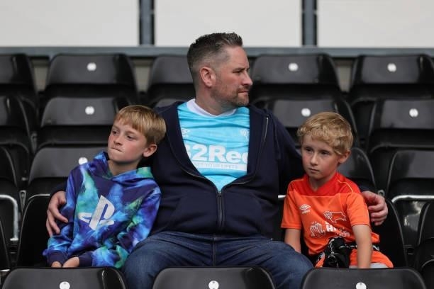Fans wait for the match to start ahead of the Sky Bet Championship match between Derby County and Middlesbrough at Pride Park Stadium, Derby, UK, on...