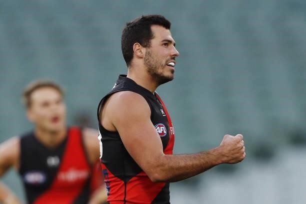 Alec Waterman of the Bombers celebrates a goal during the 2021 AFL Round 23 match between the Essendon Bombers and the Collingwood Magpies at the...