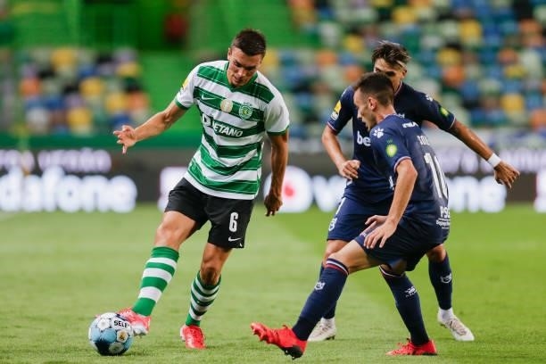 Palhinha of Sporting CP battle for the ball during the Liga Portugal Bwin match between Sporting CP and Belenenses SAD at Estadio Jose Alvalade on...