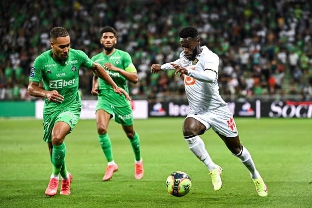 Yvann MACON of Saint Etienne and Jonathan BAMBA of Lille during the French Ligue 1 Uber Eats soccer match between Saint Etienne and Lille at Stade...