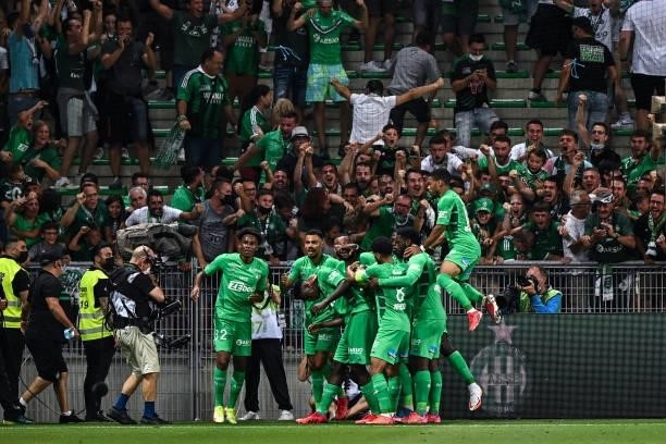 Saidou SOW of Saint Etienne celebrates his goal with team mates during the French Ligue 1 Uber Eats soccer match between Saint Etienne and Lille at...