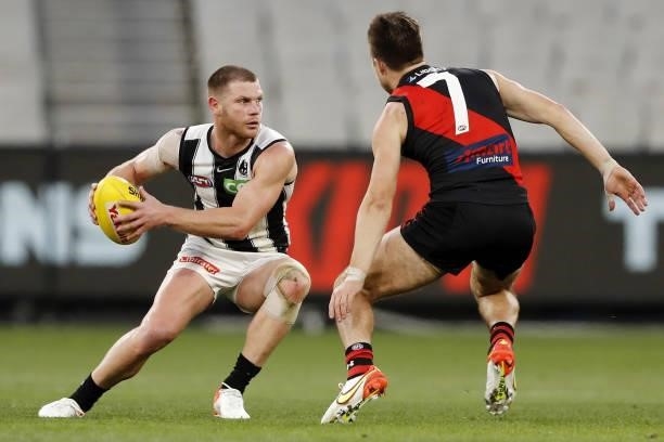 Taylor Adams of the Magpies in action during the 2021 AFL Round 23 match between the Essendon Bombers and the Collingwood Magpies at the Melbourne...