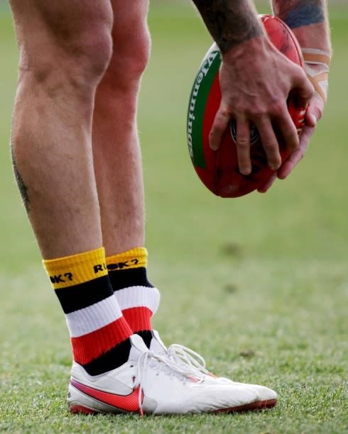 St Kilda player wear R U OK socks during the 2021 AFL Round 23 match between the St Kilda Saints and the Fremantle Dockers at Blundstone Arena on...