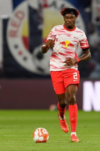 Mohamed Simakan of RB Leipzig controls the ball during the Bundesliga match between RB Leipzig and VfB Stuttgart at Red Bull Arena on August 20, 2021...