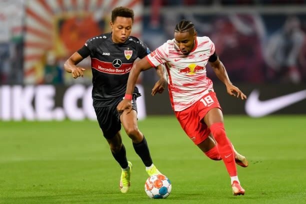 Christopher Nkunku of RB Leipzig and Roberto Massimo of VfB Stuttgart battle for the ball during the Bundesliga match between RB Leipzig and VfB...
