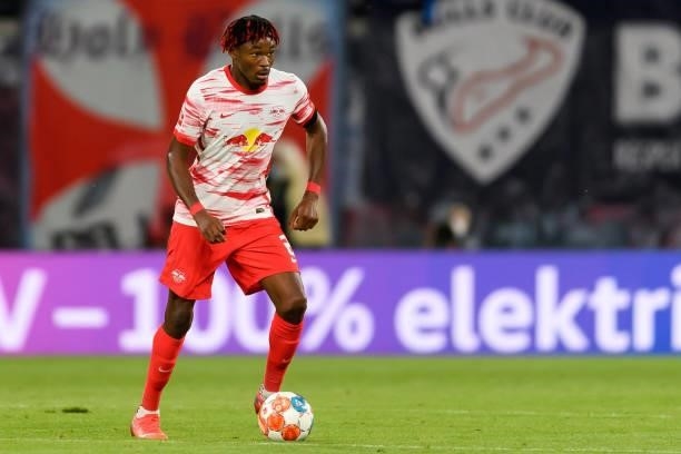 Mohamed Simakan of RB Leipzig controls the ball during the Bundesliga match between RB Leipzig and VfB Stuttgart at Red Bull Arena on August 20, 2021...