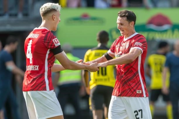 Nico Schlotterbeckof SC Freiburg and Nicolas Hoefler of SC Freiburg gestures during the Bundesliga match between Sport-Club Freiburg and Borussia...