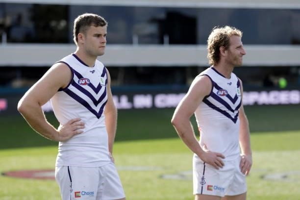 Sean Darcy of the Dockers and David Mundy of the Dockers looks dejected after a loss during the 2021 AFL Round 23 match between the St Kilda Saints...