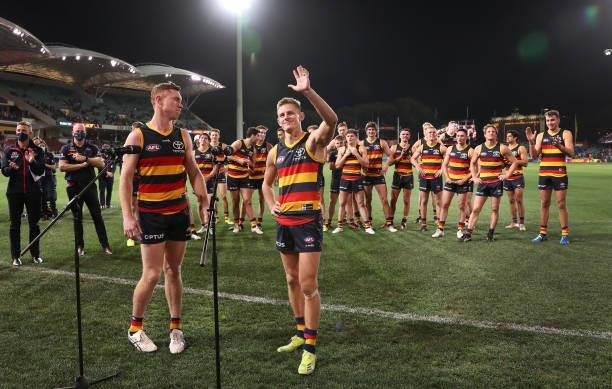 Crows players Tom Lynch and David Mackay make speeches on the oval before leaving during the 2021 AFL Round 23 match between the Adelaide Crows and...