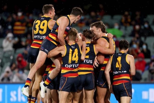 Lachlan Gollant of the Crows celebrates a goal during the 2021 AFL Round 23 match between the Adelaide Crows and the North Melbourne Kangaroos at...