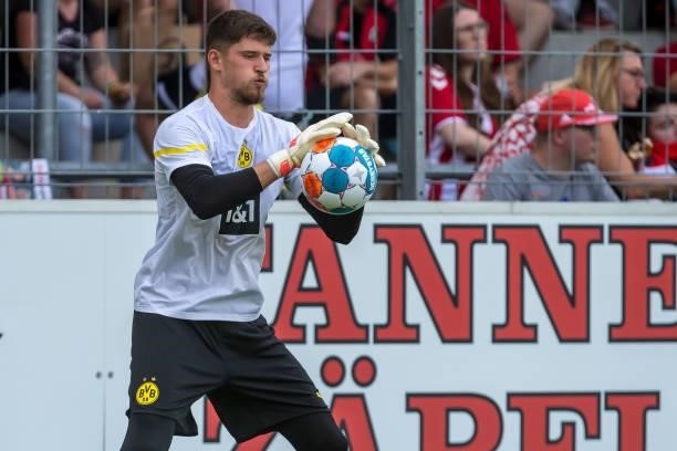 Goalkeeper Gregor Kobel of Borussia Dortmund controls the Ball prior to the Bundesliga match between Sport-Club Freiburg and Borussia Dortmund at...