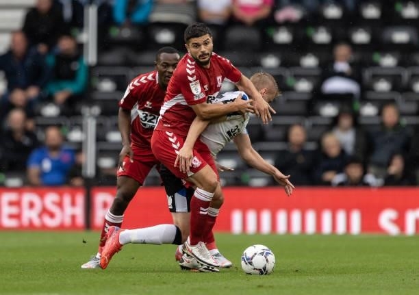 Middlesbrough's Sam Morsy competing with Derby County's Louie Sibley during the Sky Bet Championship match between Derby County and Middlesbrough at...