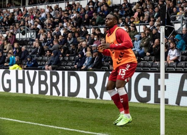 Middlesbrough's Toyosi Olusanya warming up at the side of the pitch during the Sky Bet Championship match between Derby County and Middlesbrough at...