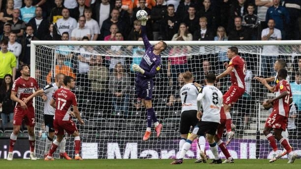 Middlesbrough's Joe Lumley saves during the Sky Bet Championship match between Derby County and Middlesbrough at Pride Park Stadium on August 21,...