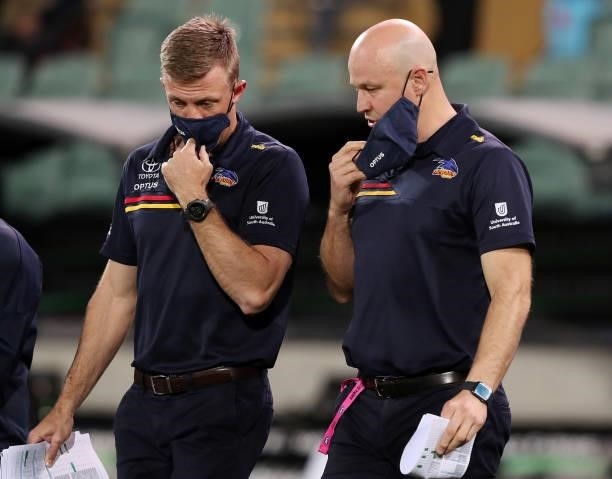 Nathan Van Berlo, Assistant Coach of the Crows and Matthew Nicks during the 2021 AFL Round 23 match between the Adelaide Crows and the North...
