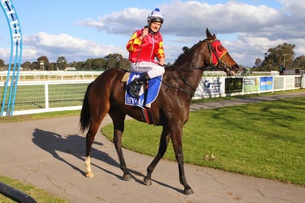 Full Ahead ridden by Jason Maskiell returns to the mounting yard after winning the Your Everyday Gourmet 0 - 58 Handicap at Wangaratta Racecourse on...