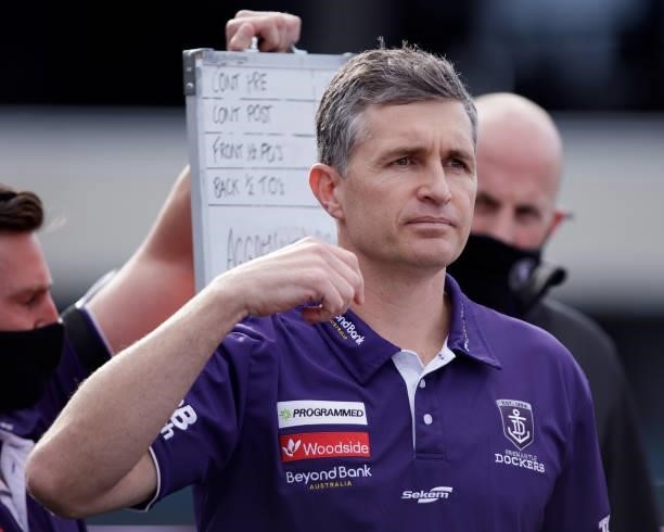 Justin Longmuir, Senior Coach of the Dockers addresses his players during the 2021 AFL Round 23 match between the St Kilda Saints and the Fremantle...