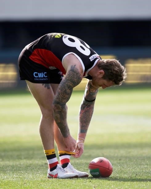 Tim Membrey of the Saints put hid mouth guard in hi sock during the 2021 AFL Round 23 match between the St Kilda Saints and the Fremantle Dockers at...